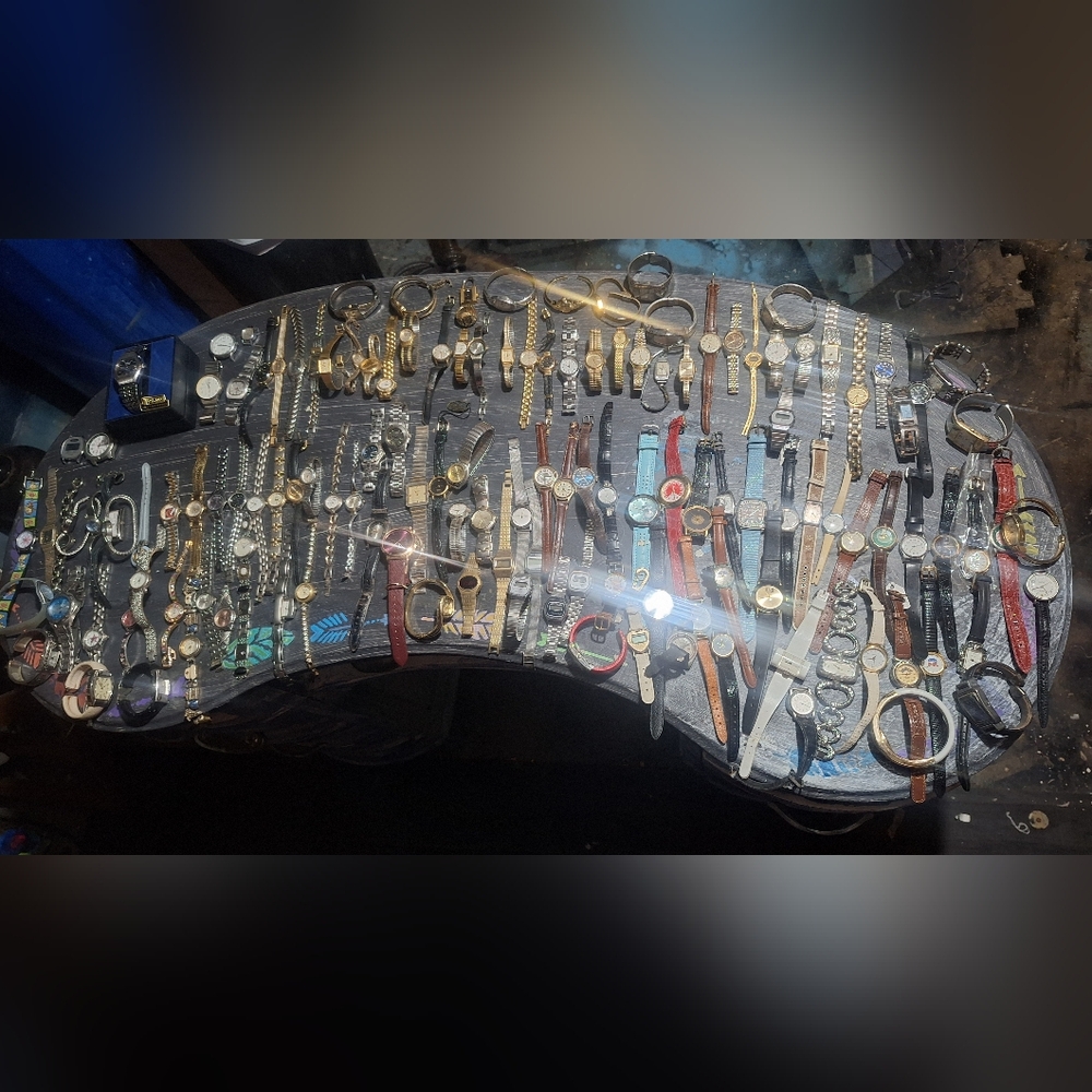 Various brands of wrist watches